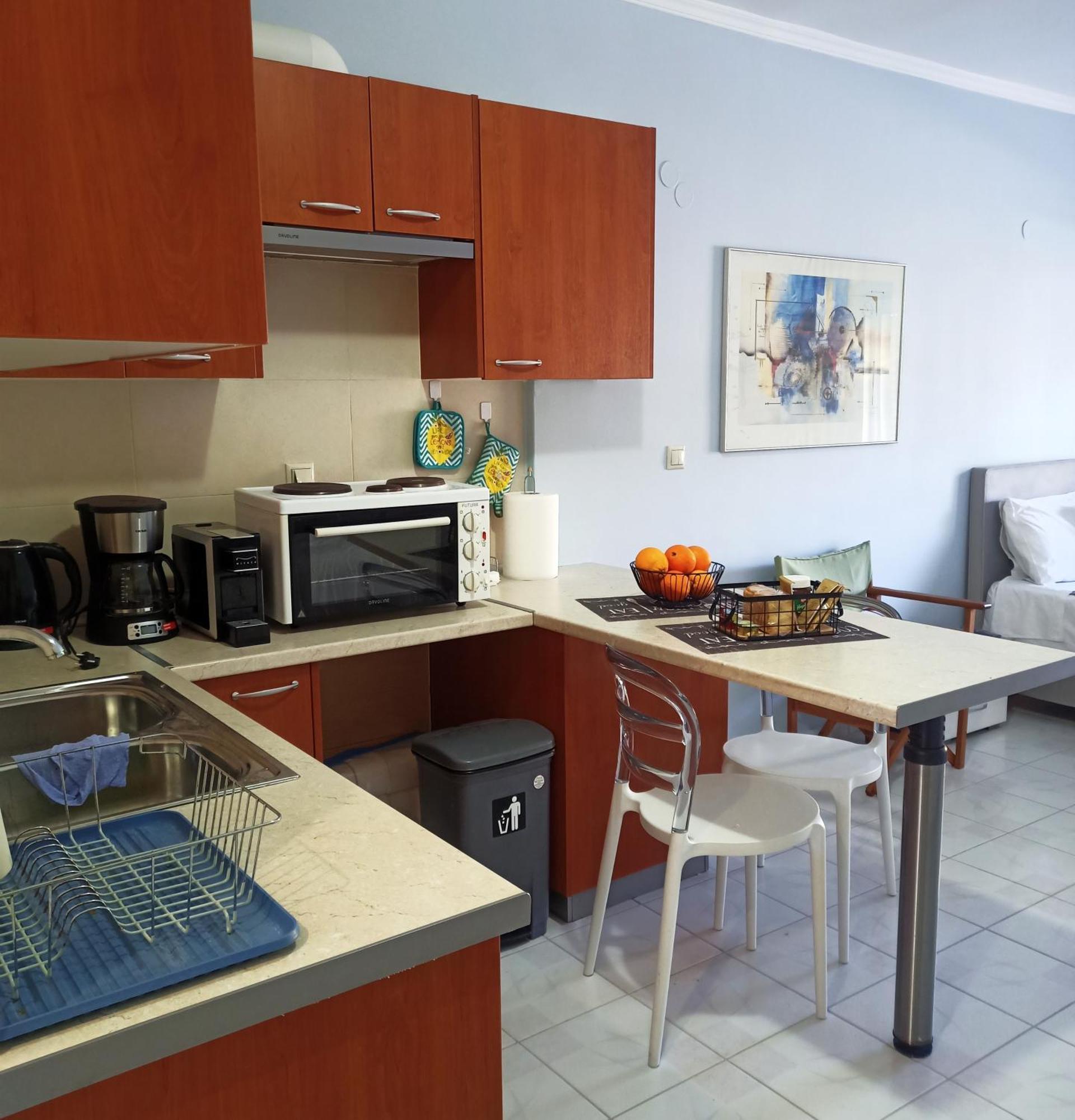 Gm Apartments Tolo Bagian luar foto